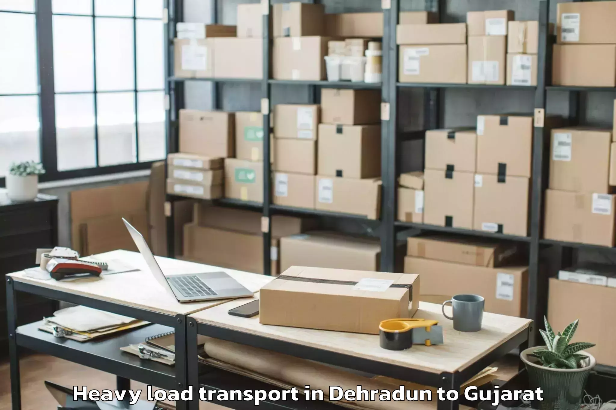 Easy Dehradun to Madhavpur Heavy Load Transport Booking